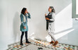 © Cavan Images - Real estate agent showing to woman while standing in rental apartment
