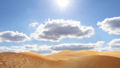 Picturesque view of sandy desert and blue sky on hot sunny day