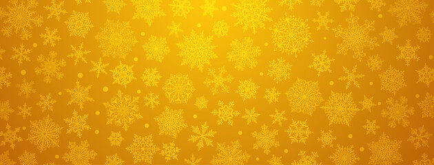 Christmas background of big and small complex snowflakes in yellow colors