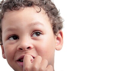 Wall Mural - child biting his finger nails and sucking thumb stock photo