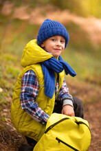 Boy Scout In The Autumn Forest