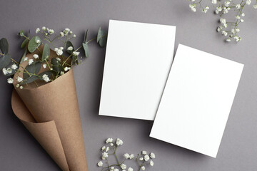 wedding invitation card mockup with copy space, front and back sides, eucalyptus and gypsophila flow