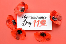 Remembrance Day In Canada. Red Poppy Flowers With Card On Red Background