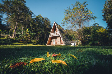 A-Frame cabin in summer morning