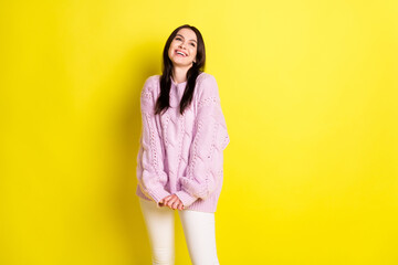 Wall Mural - Photo of generation z shy brown hairdo lady look up empty space wear pink sweater isolated on vivid yellow color background