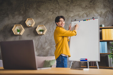 Sticker - Photo of coach trainer guy indicate forefinger empty space board remote lecture wear yellow shirt home indoors