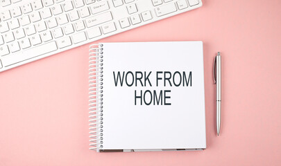 Poster - Pink office desk with keyboard and notebook with text WORK FROM HOME