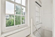 White Apartment With Staircase And Window