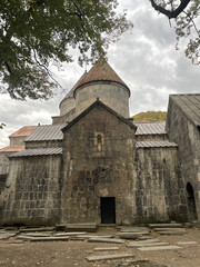 Vertical shot of the Sanahin Monastery under a cloudy sky in Lori, Armenia