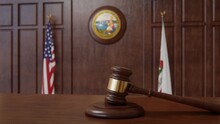 Courtroom Scene With US Flag And State Seal And Flag Of The State Of California. 3d Rendering