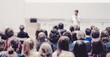 © kasto - Woman giving presentation on business conference event.