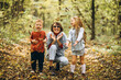© Petro - Mother with her little son and daughter in an autumn park