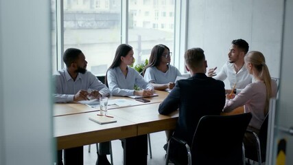 Poster - Corporate discussion of new project, young middle eastern boss communicating with partners in office