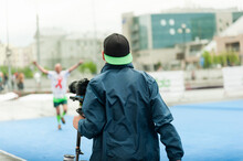 Vigeo Operator Prepares For Video Filming At The Finish Line Of The Marathon.