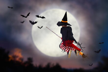 Halloween Witch Flying Broom. Huge Moon And Bat.