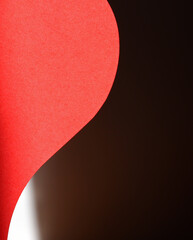 Wall Mural - red paper heart on dark background