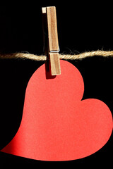 Wall Mural - red heart hanging on rope