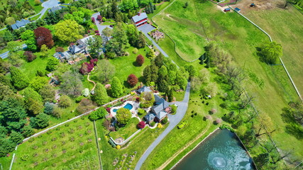 An Aerial View of Beautifully Blooming Trees and Plants and Unique Structures on a Spring Day