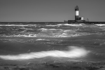 wave and lighthouse in storm weather in vintage style