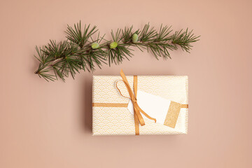 Wall Mural - Christmas background with gift boxes wrapped in golden colored paper. Xmas celebration, preparation for winter holidays. Festive mockup, top view, flat lay