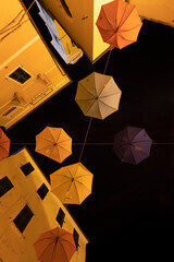 Wall Mural - Sky of open umbrellas at night