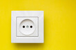 white socket  on yellow background
