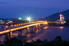 Pakse Bridge Over The Mekong River At Dusk.