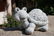 Decorative Figure Of A Turtle Near The House