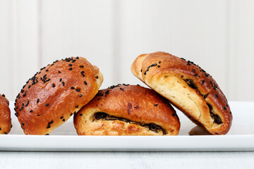 Canvas Print - Crunchy buns with cabbage and nigella.