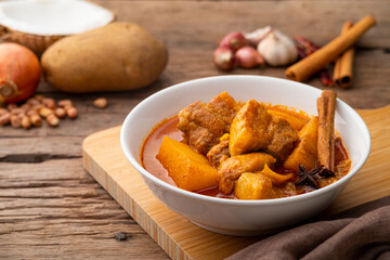 Wall Mural - Massaman Curry with pork meat in white bowl