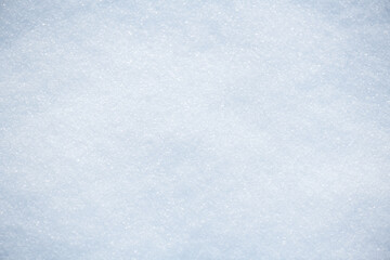 Wall Mural - snow background, winter backdrop. christmas nature. white cold waves of snow sparkles in the sun. xm