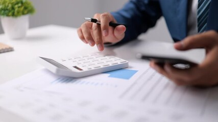 Poster - Businessmen are using cellphones to get internet information and audit financial reports by examining the graphs in company reports. Analyzing income and analyzing the budget idea