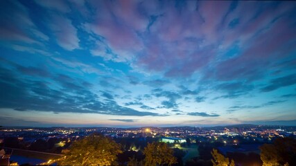 Wall Mural - timelapse dawn sunrise sunset over the morning city