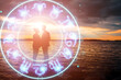 © Aliaksandr Marko - Horoscope concept, couple guy and girl on the background of a circle with the signs of the zodiac, astrology. Conceptual photo of a couple with perfect match between the signs of the zodiac.