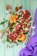 Wall Mural - Still life with fruit salad on wooden background