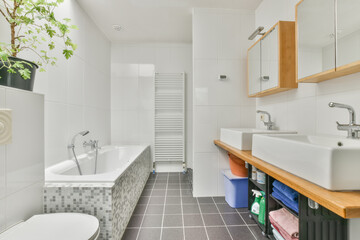 Wall Mural - Interior shot of a bathroom with double sinks and white tiles on the walls