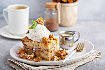 Wall Mural - Apple bread pudding with caramel sauce and ice cream