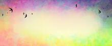 Birds In Flock On Sunset Sky Watercolor Background, Black Bird Silhouette Against Pastel Yellow Sky With Painted Blue Purple Pink Green Orange And Yellow Rainbow Border Colors, Beautiful Animal