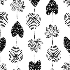 Wall Mural - Seamless vector pattern with leaves of tropical plants and trees. Black and white wallpaper with spots and spirals isolated on a white background. Floral monochrome print.