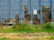 Corrugated Metal Siding Is Falling Away From An Abandoned Grain Elevator In Southeastern Washington, USA