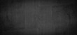 © Corri Seizinger - Black anthracite stone concrete texture background panorama banner