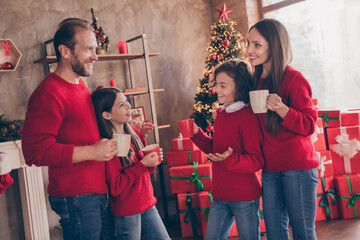 Poster - Photo of cheerful relaxed comfort family hold cup enjoy coffee evergreen tree in decorated x-mas home indoors