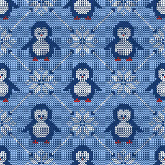 Wall Mural - Knitted seamless pattern with penguins and scandinavian ornament. Winter sweater background. Vector illustration.