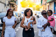 © Westend61 - Happy family walking together on road