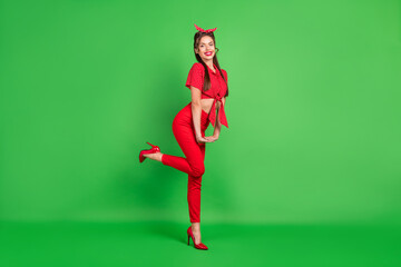 Canvas Print - Full length body size photo young woman wearing red outfit smiling cheerful isolated bright green color background