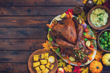 Fototapeta Tulipany - Traditional Stuffed Turkey with Side Dishes for Holidays