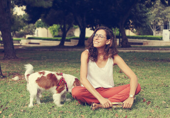 Wall Mural - Woman 45 years old with walking the dog in the park