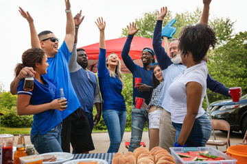 Wall Mural - Team supporters celebrating at a tailgate party