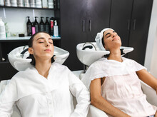 Female Clients In Hairdressing Salon