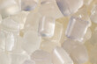 © Nastia - Transparent granules of polypropylene or polyamide. background. Plastics and polymers industry.